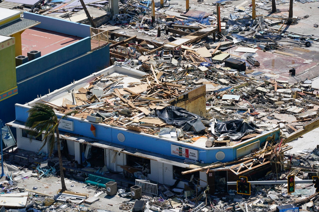 Commercial businesses are seen Thursday in the wake of Hurricane Ian in Fort Myers Beach.