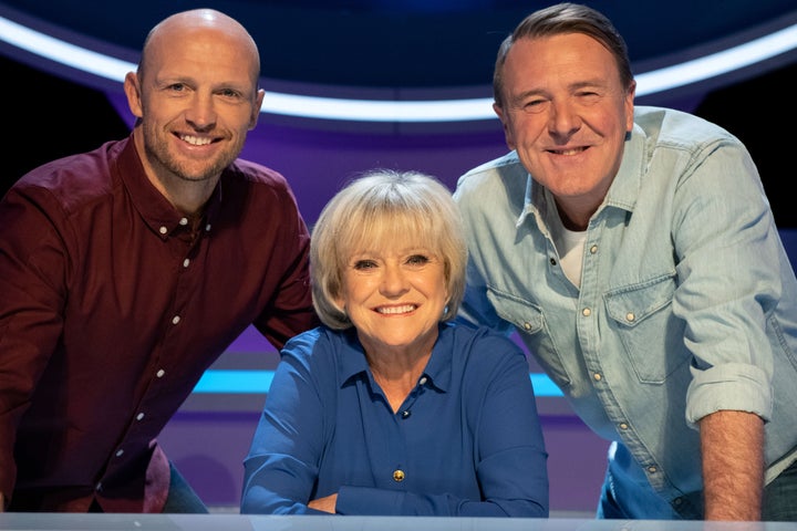 Sue Barker with former team captains Matt Dawson (left) and Phil Tufnell.
