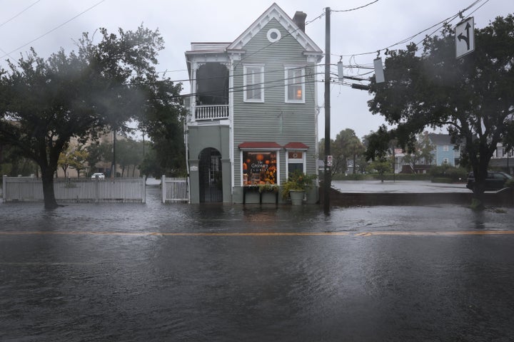 Rain from Hurricane Ian floods a street in Charleston, South Carolina, on Friday.