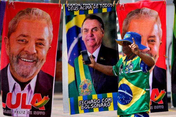 Nearly a dozen candidates are running in Brazil’s presidential election but only two stand a chance of reaching a runoff: former President Luiz Inácio Lula da Silva (whose image appears at left) and incumbent Jair Bolsonaro (whose image appears in the center).