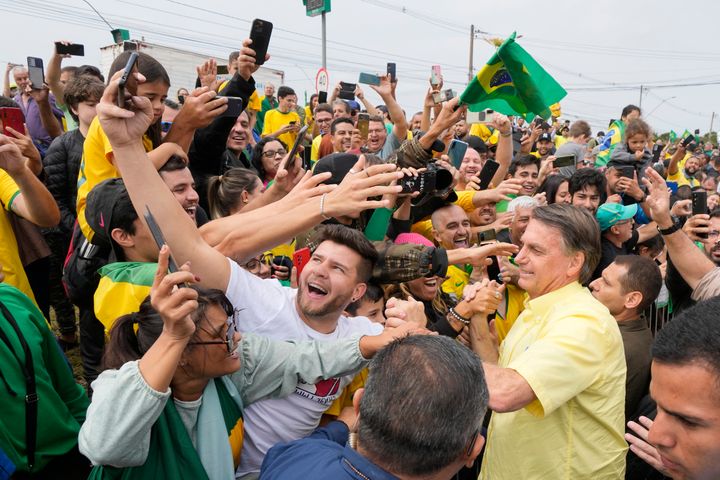 Allies of Brazil President Jair Bolsonaro prevailed in key downballot races during Sunday's election, suggesting that his far-right movement will live on even if he loses a presidential runoff race on Oct. 30.