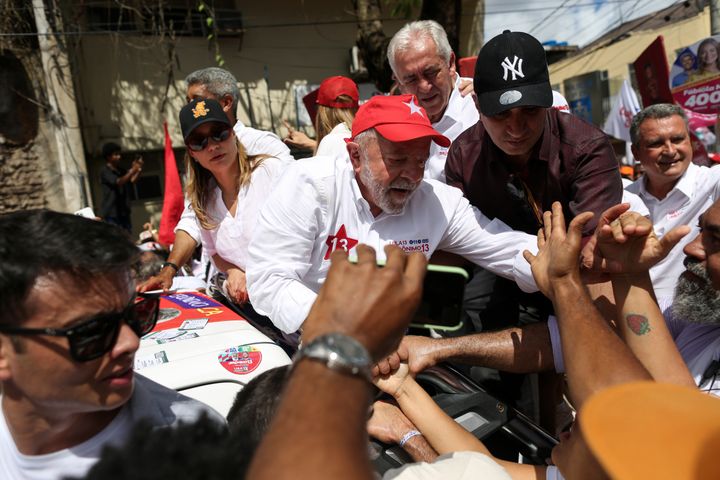 Former Brazilian President Luiz Inácio Lula da Silva, center, who is running for president again with the Workers' Party, campaigns in Salvador, Brazil, on Sept. 30, 2022. Brazil's general elections are scheduled for Oct. 2.