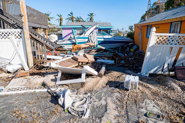 A damaged property is seen near a broken section of Pine Island Road on Sept. 29, 2022, in Matlacha, Florida. (Matias J. Ocner/Miami Herald/Tribune News Service via Getty Images)