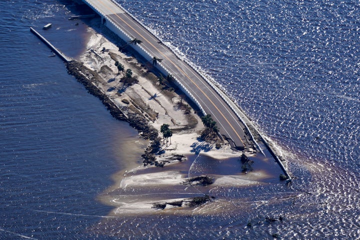 Damage from Hurricane Ian is seen on the causeway leading to Sanibel Island from Fort Myers, Florida.