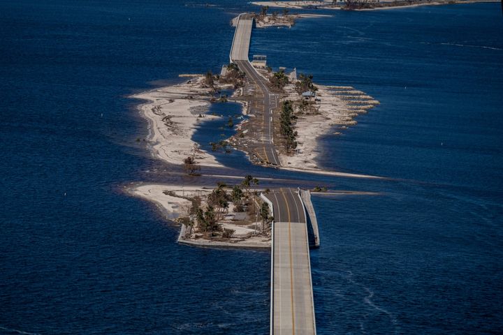 An aerial picture taken on Sept. 30 shows the collapsed Sanibel Causeway in the aftermath of Hurricane Ian on Sanibel Island, Florida.