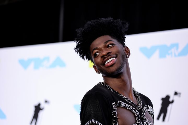 Lil Nas X poses in the press room at the 2022 MTV VMAs in August.