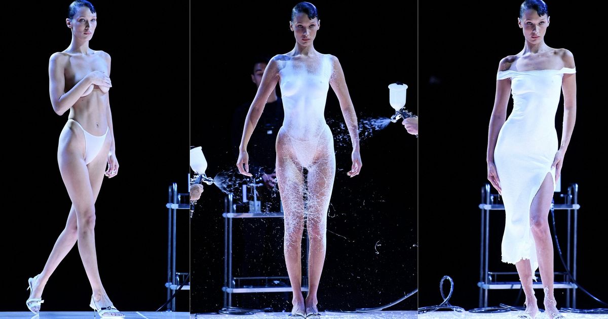 Bella Hadid Stuns As Dress Is Sprayed Onto Her Body At Paris Fashion Week