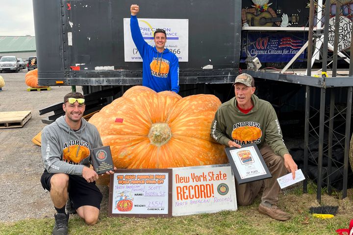 Emmett, Steve and Scott Andrusz grew the 2,554-pound pumpkin in Lancaster, New York.