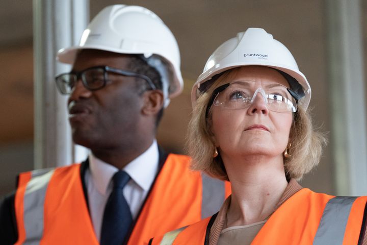 Liz Truss and Kwasi Kwarteng visit a construction site during the Tory conference in Birmingham.