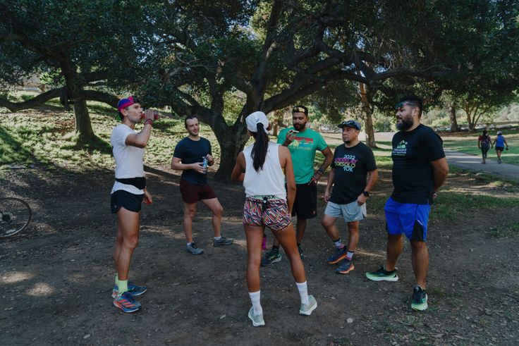The team congregates for snacks and socializing after their run at Griffith Park.