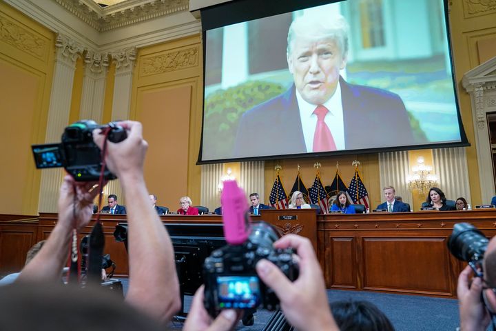 Donald Trump appears on a screen as the House select committee investigating the Jan. 6, 2021, attack on the U.S. Capitol holds a prime-time hearing on Capitol Hill on July 21, 2022.