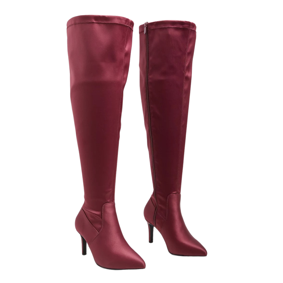 A stretchy satin extra wide calf over-the-knee boot