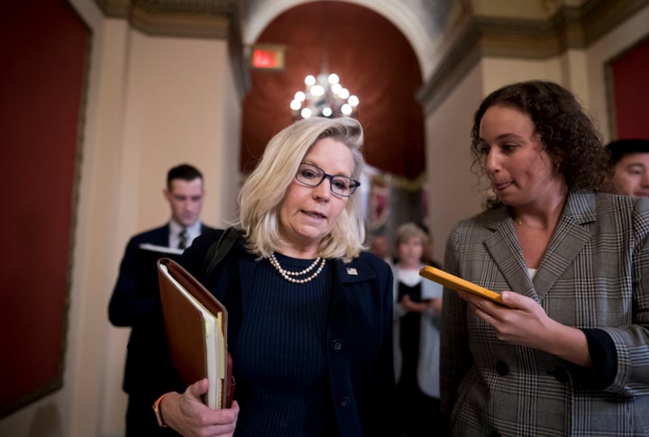 Rep. Liz Cheney, vice chair of the House committee investigating the Jan. 6, 2021, attack on the Capitol, speaks with reporters as she walks to the House chamber during final votes at the Capitol in Washington on Sept. 30,