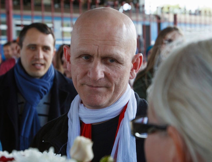 In this June 21, 2014 file photo, Belarusian human rights advocate Ales Bialiatski is welcomed by his supporters at a railway terminal in Minsk, Belarus.