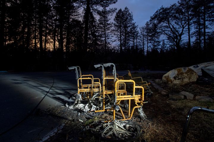 Scorched wheelchairs rest outside Cypress Meadows Post-Acute, a nursing home leveled by the Camp Fire in Paradise, California, on Dec. 4, 2018. 