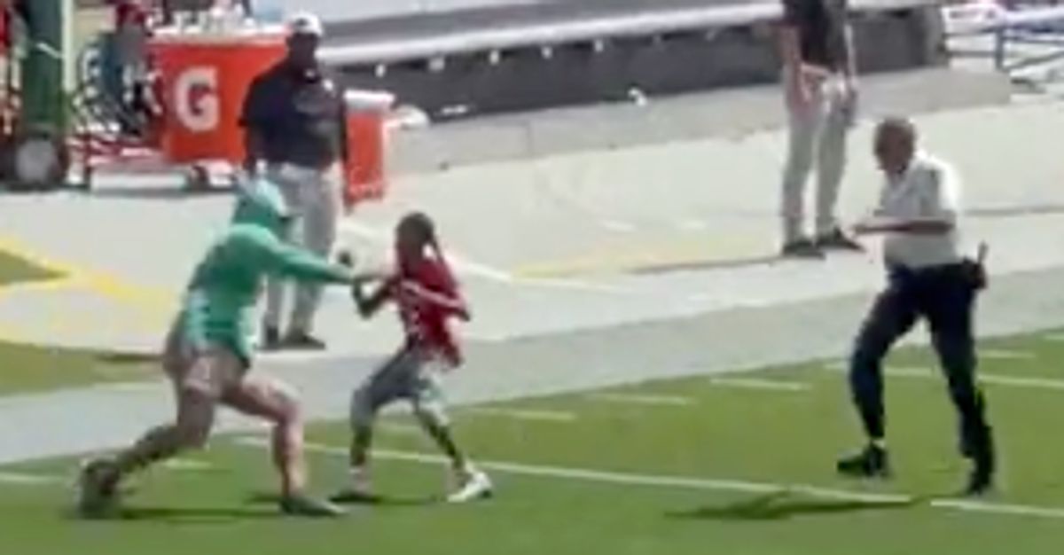 Boy tackled by security after running on field at Bucs game