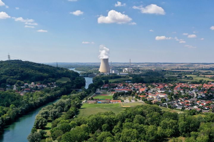 An aerial view shows steam rising from the Isar nuclear power plant, which includes the Isar 2 reactor, on August 14, 2022 in Essenbach, Germany. Isar 2 is one of the last three still operating nuclear power plants in Germany and all three are scheduled to shut down by the end of this year. However, due to the disruption in energy imports from Russia, politicians and other actors are debating extending the operational life of the plants. Some are advocating an extension until the middle of 2023, while others are pushing for longer. Approximately 80% of people polled among the general public support some kind of extension.