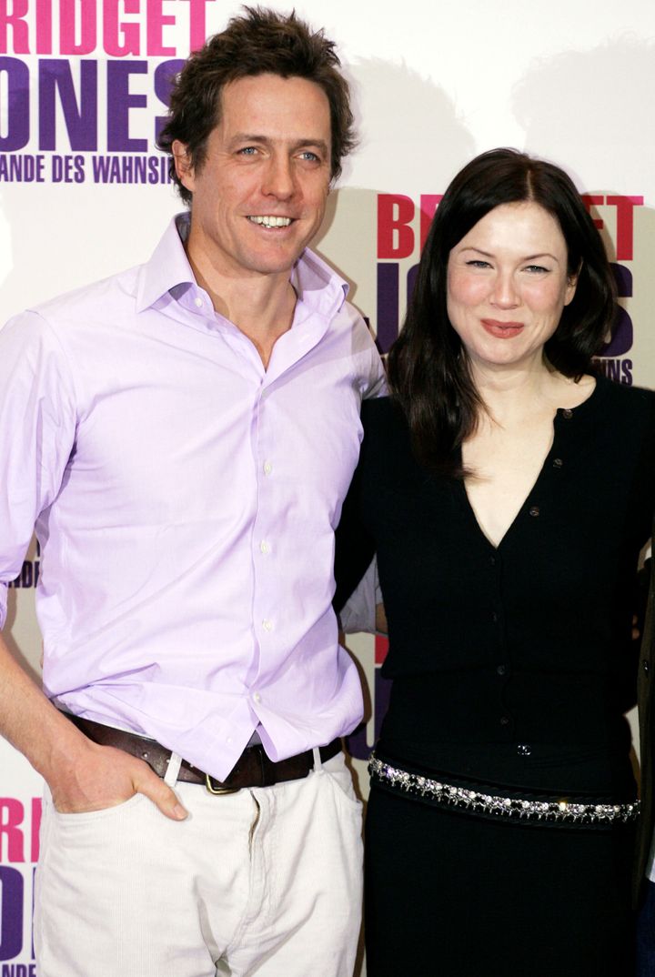 Hugh Grant and Renee Zellweger pose at the photocall to promote Bridget Jones: The Edge Of Reason on November 12, 2004 in Berlin