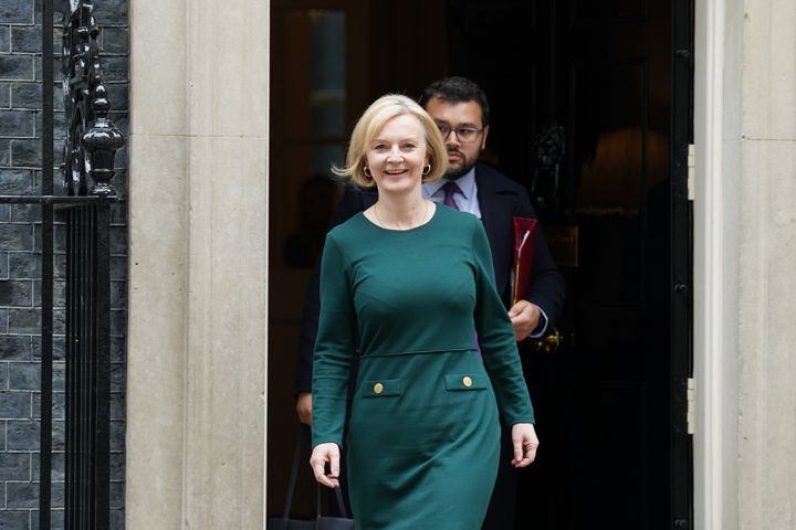 Liz Truss and an aide leave 10 Downing Street ahead of PMQs
