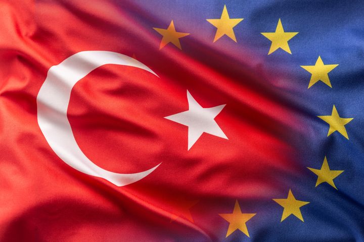 Collage of Turkish and European union flags.