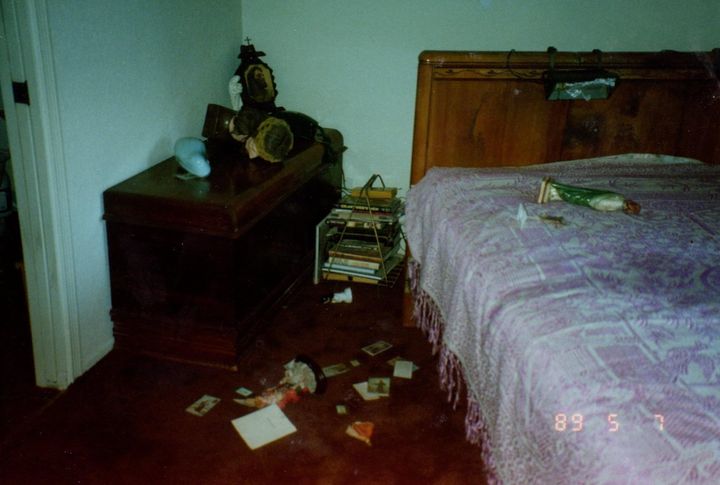 "This is a photo of my grandmother’s Catholic altar in the upstairs bedroom, which was left in a state of disorder by the entity," the author writes of this photo from May 7, 1989.