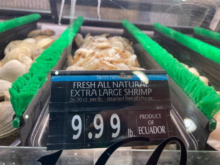 The price of shrimp is displayed at a market in Philadelphia, Thursday, June 16, 2022. (AP Photo/Matt Rourke, File)