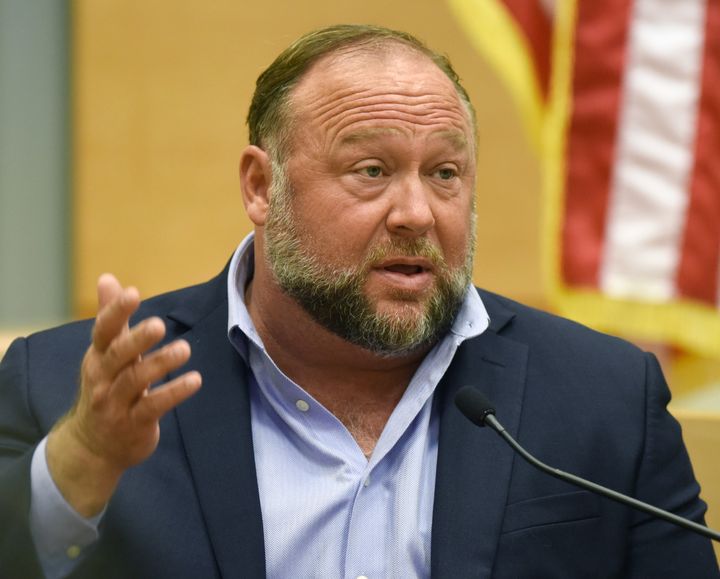 Conspiracy theorist Alex Jones, seen testifying during the trial in September, mocked the jury’s verdict Wednesday and requested donations toward his legal defense and saving his company, not for the victims' families.