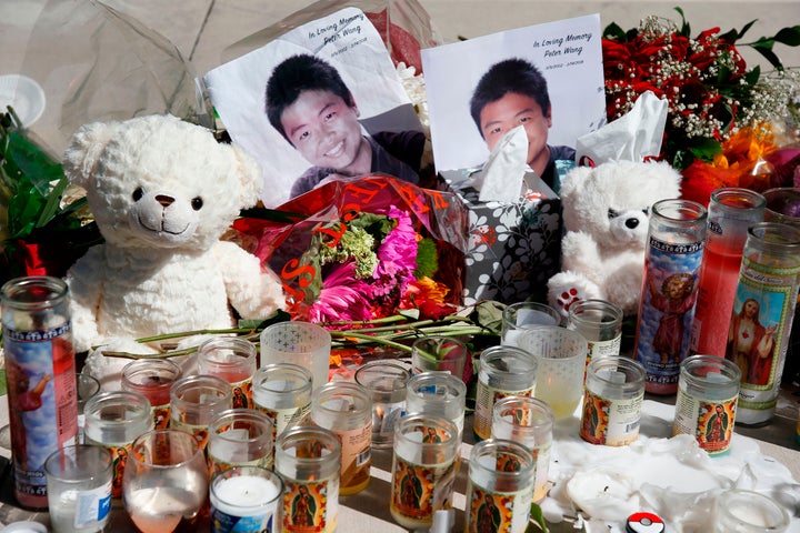 A memorial for Peter Wang, one of the victims of the Marjory Stoneman Douglas High School shooting, sits in a park in Parkland, Florida on February 16, 2018.