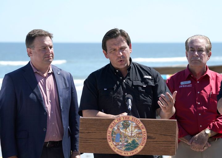 FILE - Florida Gov. Ron DeSantis speaks during a news conference last week in Daytona Beach Shores, Florida. DeSantis announced an executive order expanding voting access for the midterm elections in three counties where Hurricane Ian destroyed polling places and displaced thousands.
