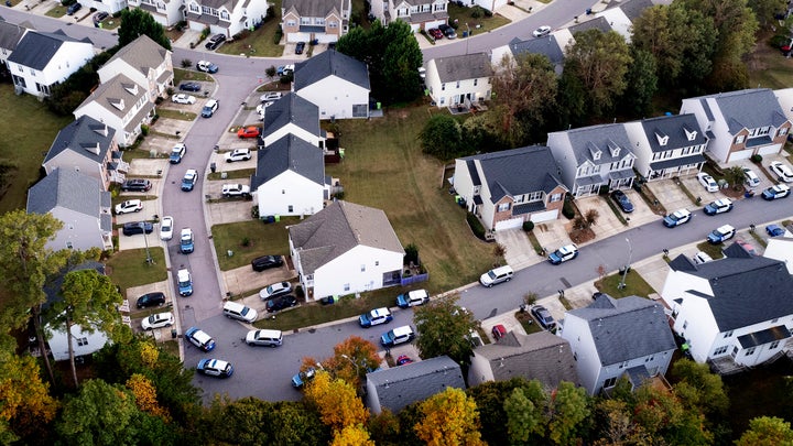 In this aerial image taken with a drone, law enforcement works at the scene of a shooting in Raleigh.