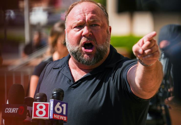 Infowars founder Alex Jones speaks outside Waterbury Superior Court amid a trial against him on Sept. 21, 2022, in Waterbury, Connecticut.