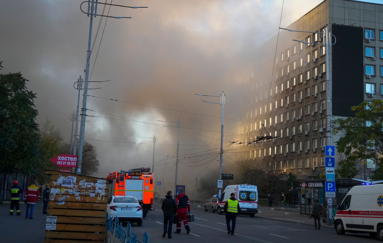 A smoke rises after a drone fired on buildings in Kyiv, Ukraine, Monday, Oct. 17, 2022.