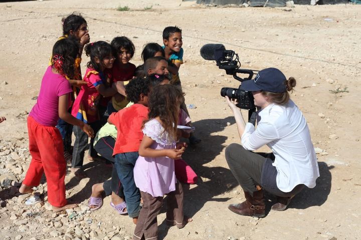 The author films with group of children in Zaatari refugee camp in Jordan in 2016.