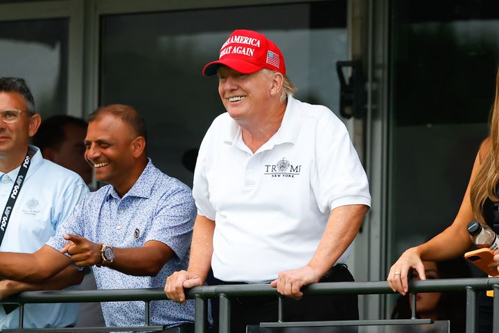 Donald Trump watches a golf tournament at his Trump National Golf Club in Bedminster, New Jersey, this past July.