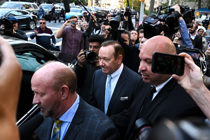 NEW YORK, NEW YORK - OCTOBER 06: Actor Kevin Spacey is surrounded by members of the media and fans as he leaves the US District Courthouse on October 06, 2022 in New York City. Spacey’s trial began today with jury selection after allegations of alleged sexual misconduct surfaced in 2017 by actor Anthony Rapp. (Photo by Alexi J. Rosenfeld/Getty Images)