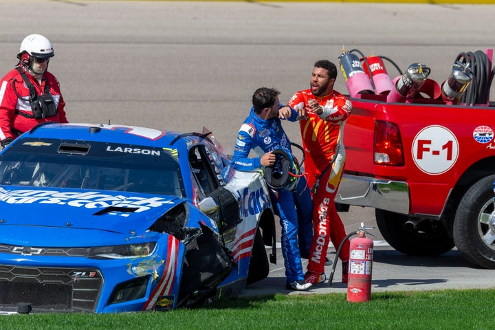 Bubba Wallace shoves Kyle Larson after their crash on Oct. 16, 2022 during a NASCAR race in Las Vegas. 