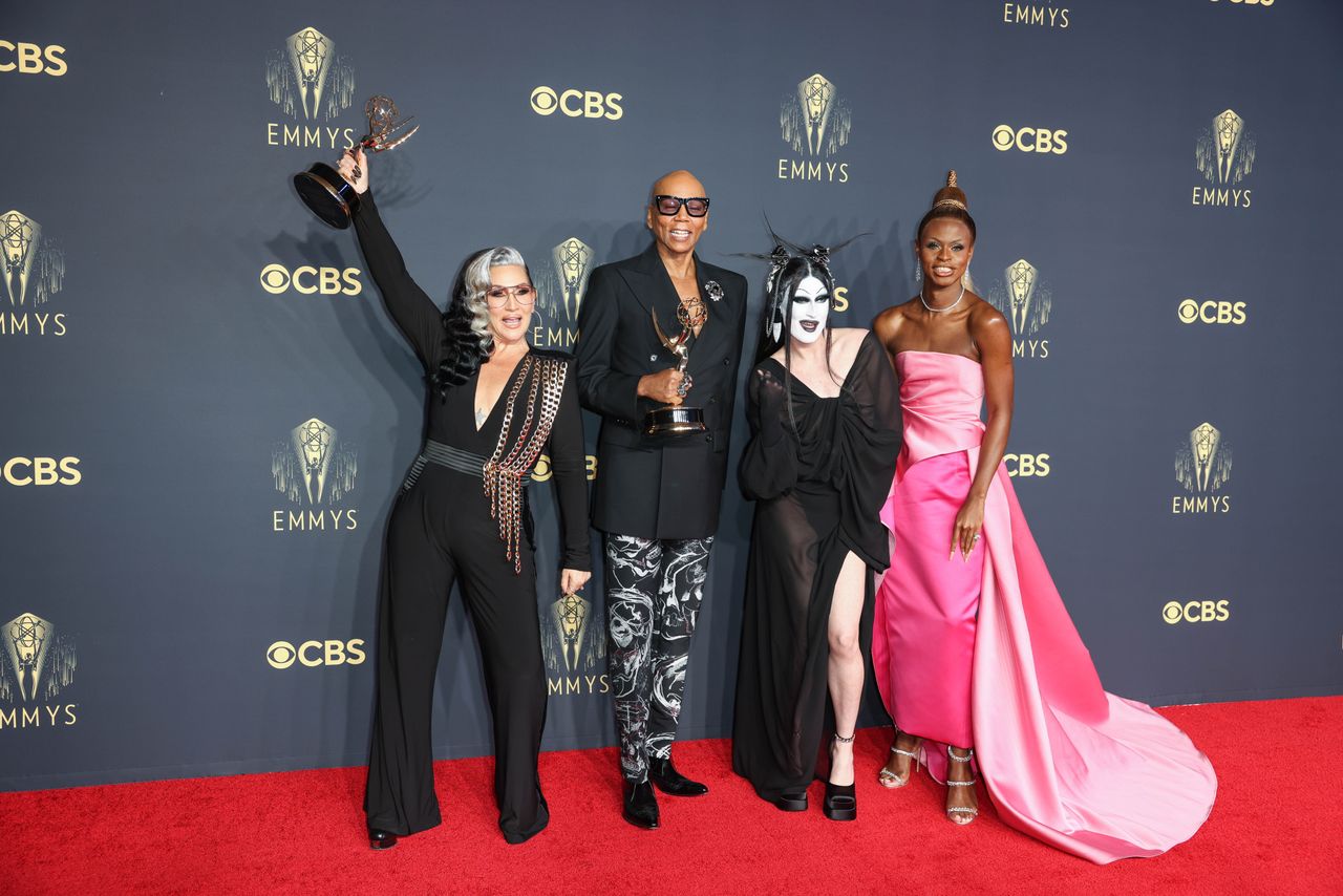 Michelle posing with RuPaul and Drag finalists Gottmik and Symone at last year's Emmys
