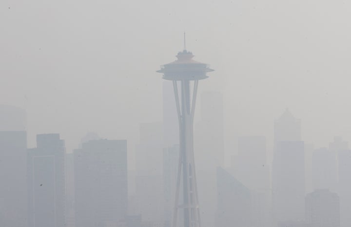 A smoky haze surrounds Seattle's iconic Space Needle on Wednesday.