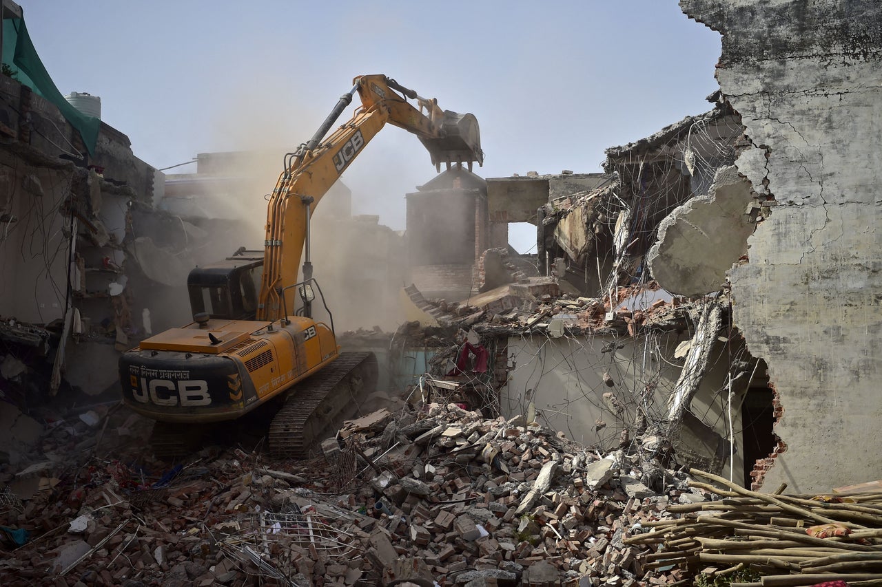 After two nights in police custody, Indian teenager Somaiya Fatima was released in time to watch live footage of an excavator claw smashing into the walls of her childhood home. The residence is among scores of dwellings and businesses flattened by wrecking crews this year in India.