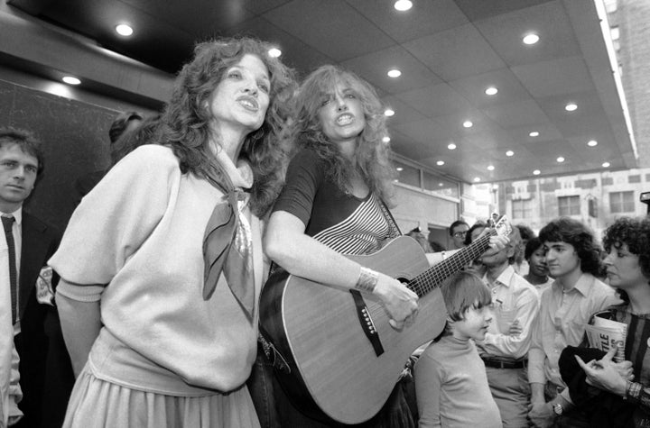 Lucy Simon (left) died of breast cancer Thursday. Carly (right) said her loss will be "haunting."