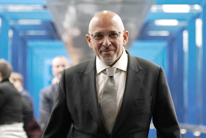 Chancellor of the Duchy of Lancaster Nadhim Zahawi, walks across the Hyatt hotel bridge at the Conservative Party annual conference at the International Convention Centre in Birmingham. Picture date: Sunday October 2, 2022.