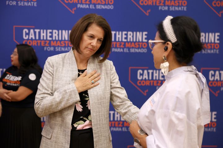 Cortez Masto greets an attendee at an event to mark Hispanic Heritage Month in Las Vegas.