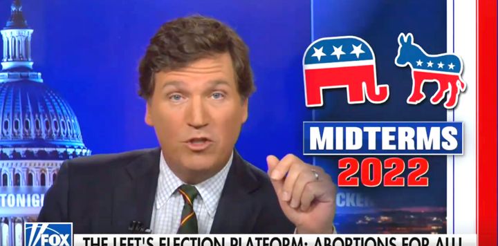 Tucker Carlson flirted with QAnon conspiracies on Monday, suggesting that the Democratic Party was a “child sacrifice cult.”