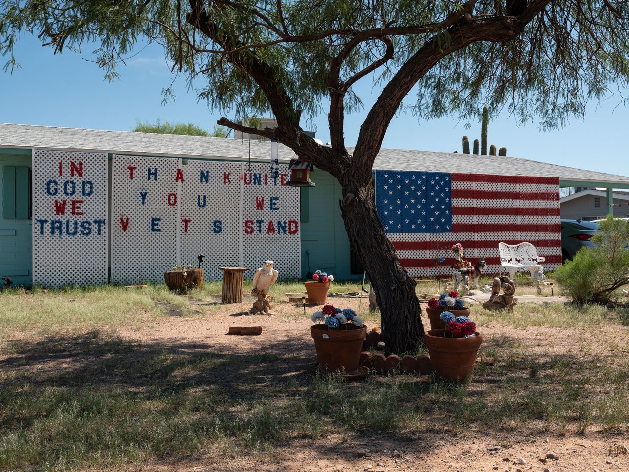 Patriotic decorations dominate a yard in Apache Junction, Arizona.