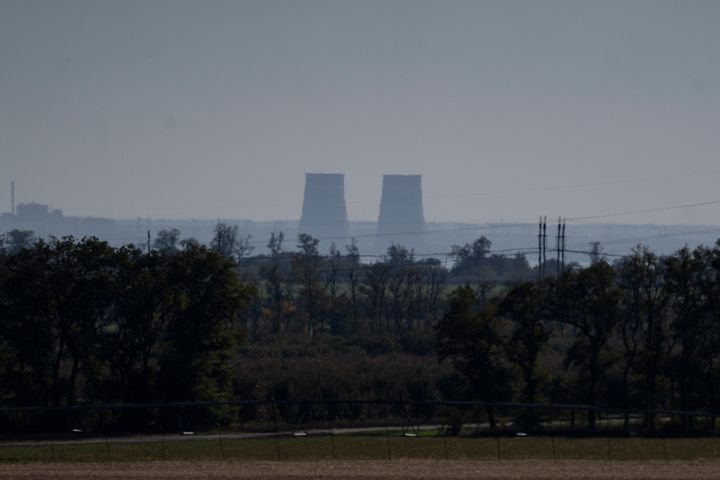 Zaporizhzhia nuclear power plant is seen from around twenty kilometers away in an area in the Dnipropetrovsk region, Ukraine, Monday, Oct. 17, 2022. (AP Photo/Leo Correa, File)