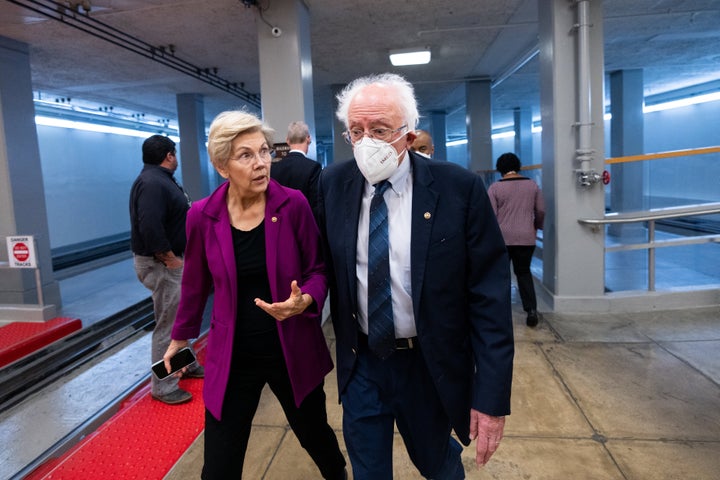 Sens. Elizabeth Warren (D-Mass.) and Bernie Sanders (I-Vt.), probably talking about corporate greed.