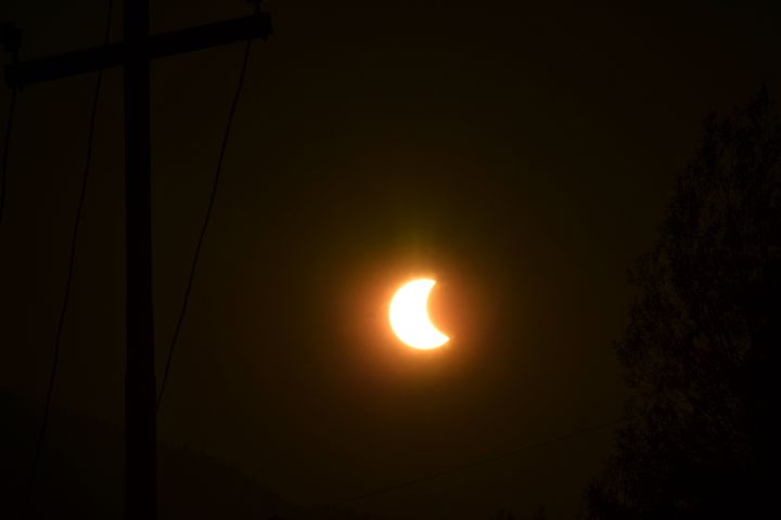 A partial solar eclipse is observed in Srinagar, India.  A maximum solar disk obstruction of 55% was observed in the city.