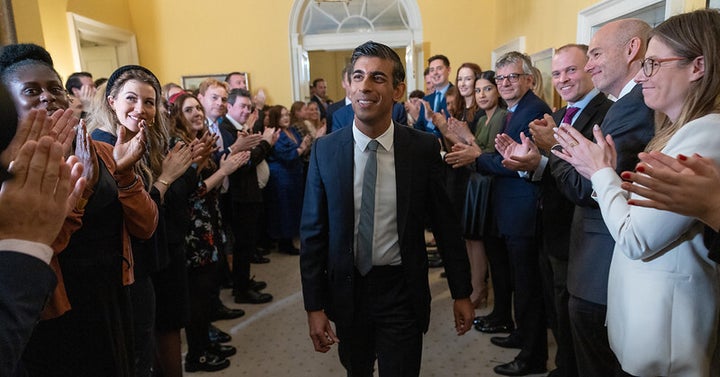 Rishi Sunak walking among his new colleagues in No.10