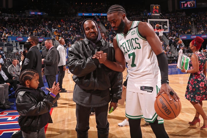 Former client Jaylen Brown of the Boston Celtics with Kanye West and his son Saint West in March.