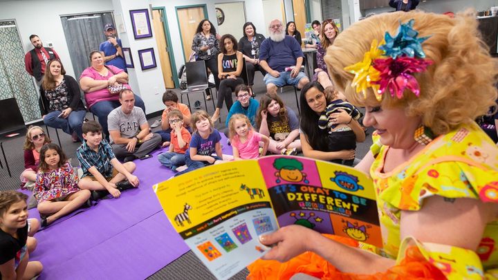 Rich Kuntz, also known as Gidget, reads to children during Drag Queen Story Hour on March 21, 2019. The LGBT+ Center Orlando canceled a weekend drag queen story hour for children after receiving online threats.